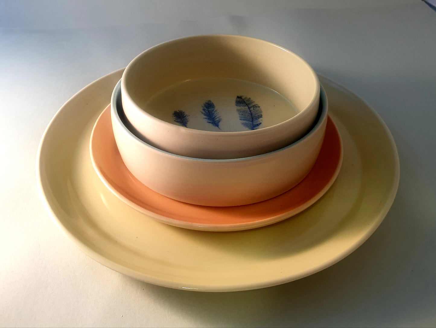 Set of "Feather" plates & bowls