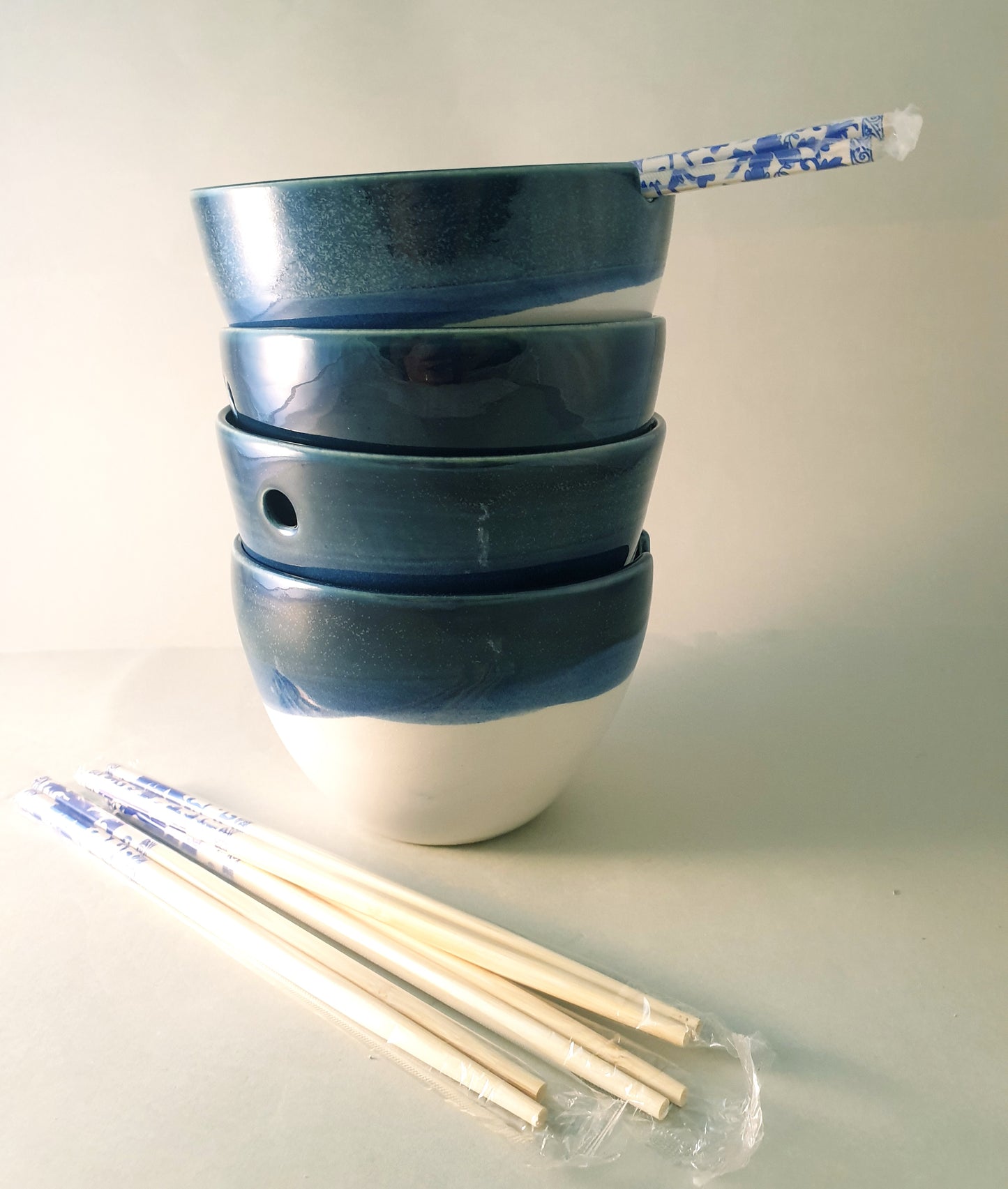Set of 4 rice bowls/w chopsticks.