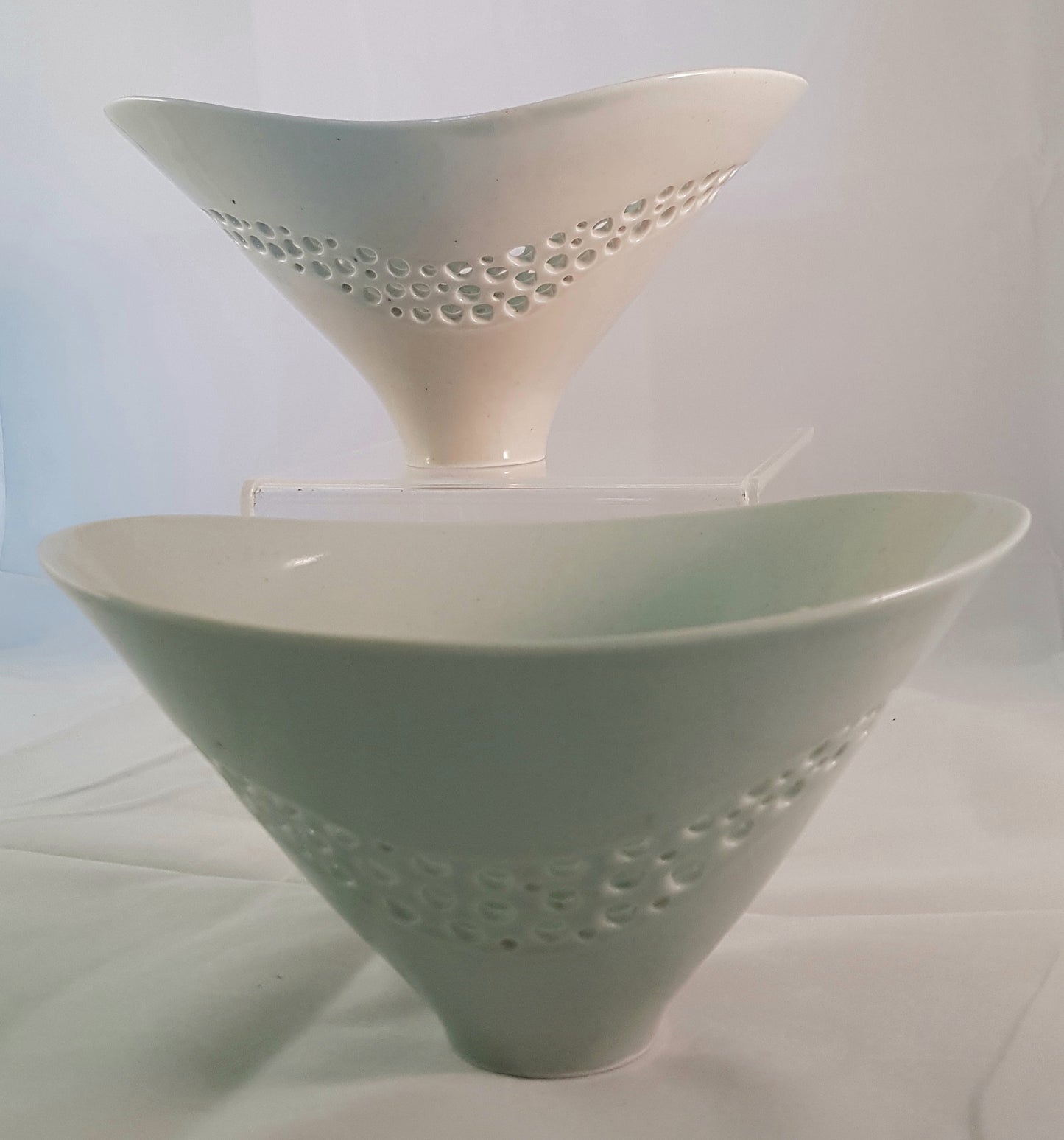 Set of 2 porcelain/celadon glazed bowls.