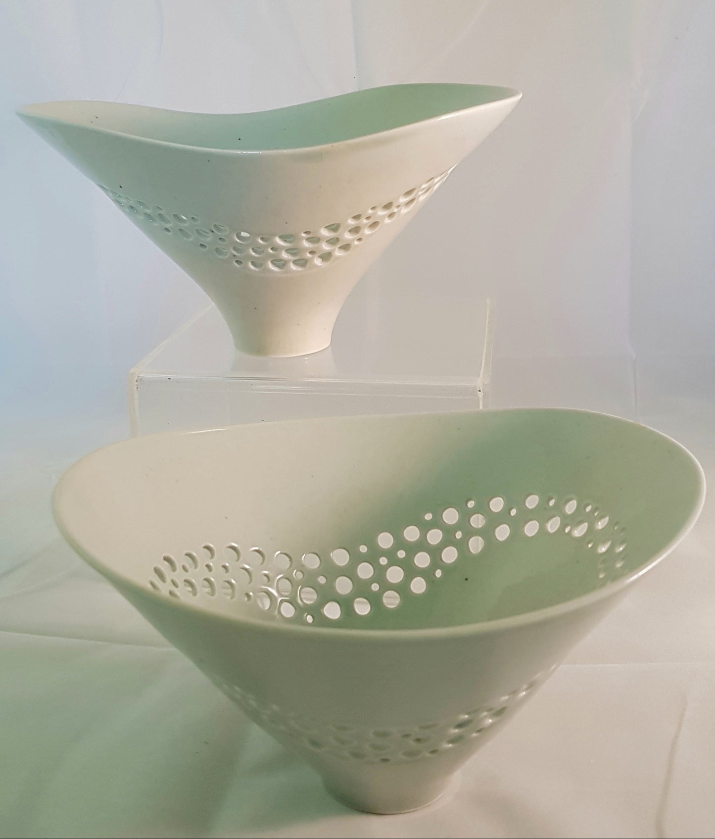 Set of 2 porcelain/celadon glazed bowls.